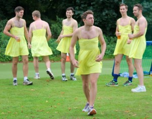 cricket men in dresses